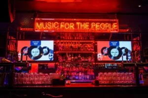 red music of the people neon-light signage
