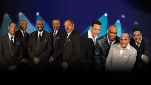 The Four Tops and The Temptations line-up in dark suits