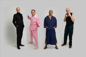 Dexys, four band members in contrasting outfits
