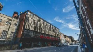 The Everyman Theatre's portrait facade on Hope Street, Liverpool, under a blue sky