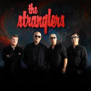 The Stranglers, four band members in black, beneath their red logo
