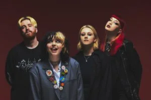 CRAWLERS, four band members, against a red background