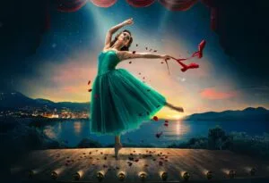 Image for Matthew Bourne's The Red Shoes: a dancer in a green dress on a moonlit stage