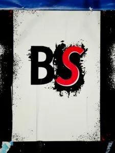 Poster with the letters BS in black and red on a white sheet
